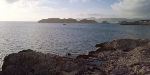 Boats on the Mediterranean at sunset Stock Footage 98387953