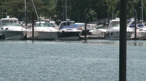 Boats moored along a dock. Video stock 8981845