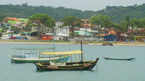 Boats moored on harbor Stock Footage 57814408