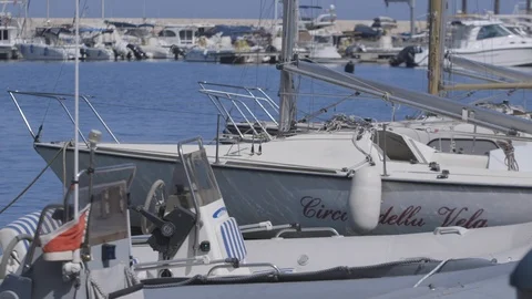 Boats moored at harbor Stock Footage 89978819