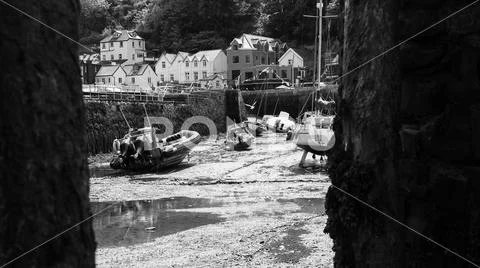 Boats moored in Lynmouth harbor at low tide Stock Photos