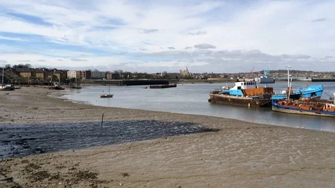 Boats moored in river Stock Footage 93866875