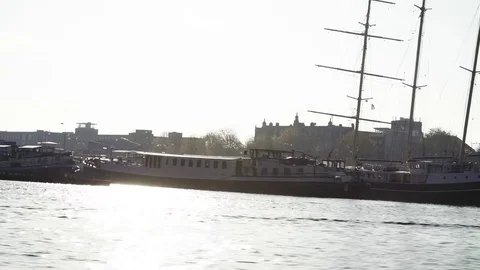 Boats moored in riverside Stock Footage 71535834
