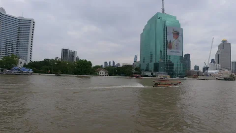 Boats navigating the Chao Phraya River in Bangkok Stock Footage 310040121