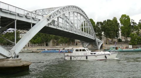 Boats navigating under Passarelle Debilly in Paris Stock Footage 59967471