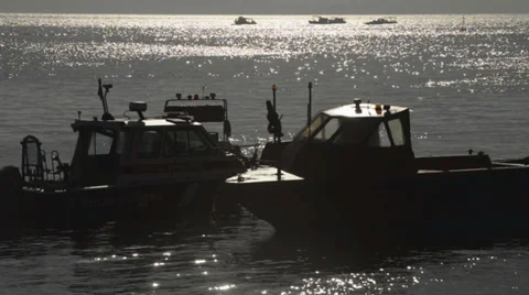 Boats in the Ocean During The Sunset Stock Footage 35619824