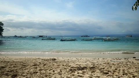 BOATS PARKED NEXT TO BEACH Stock Footage 221666468