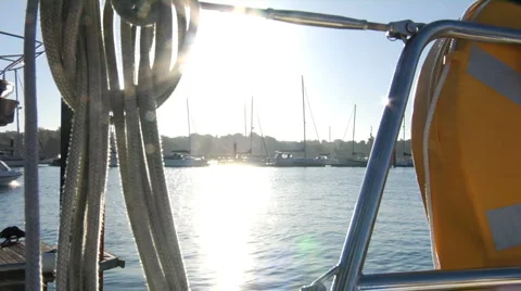 Boats pass in sunlight Stockbeeldmateriaal 958645