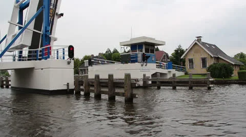 Boats passing an open bridge Stock Footage 24925501