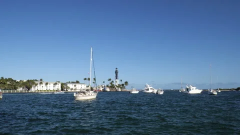 Boats at Pompano Beach Lighthouse Stock Footage 200842752