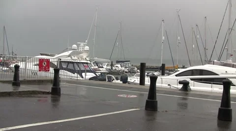 Boats in the rain Stock Footage 7139328