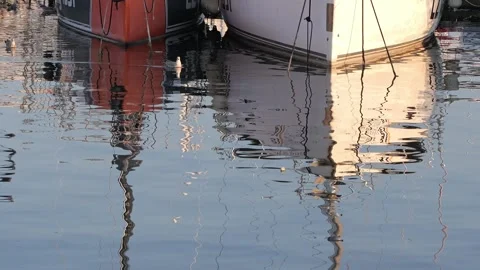 Boats reflection on water creating abstract ripples Stock Footage 339048222