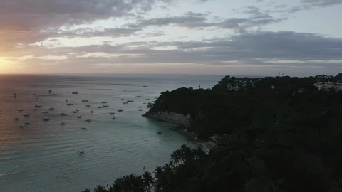 Boats returning during sunset in Boracay, Philippines (Drone, 4k LOG) Stock Footage 117468678
