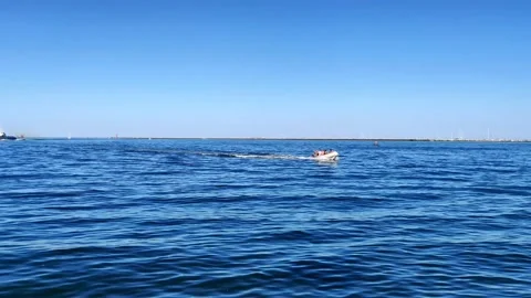 Boats returning to the pier Stock Footage 134454714