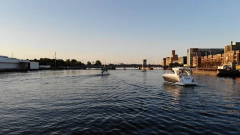Boats on the River During a Calm Sunset Downtown Stock Footage