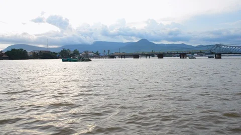 Boats at the river in Kampot Stock Footage 99682914