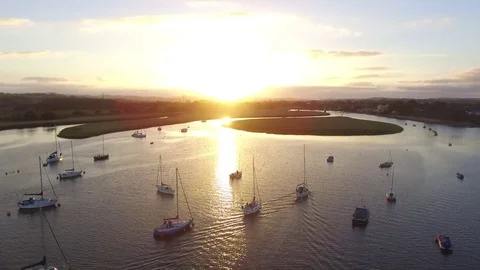 Boats on river at sunset Stock Footage 81185481