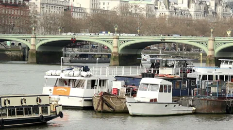 Boats on river thames red bus on bridge Stock Footage 35783431