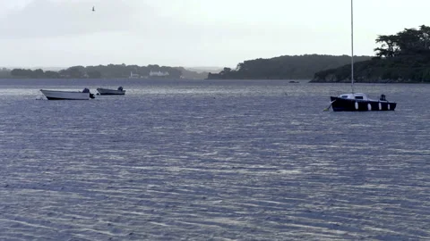 Boats sailing through in an ocean Stock Footage 237645771