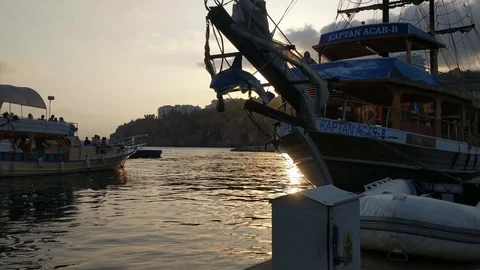 Boats in the seaport of Antalya at sunset Stock Footage