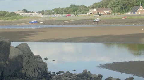 Boats stranded on sand at low tide Stock-Footage 66777775