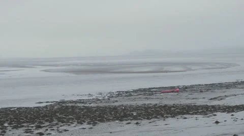 Boats stranded with tide out in the rain Stock-Footage 66777894