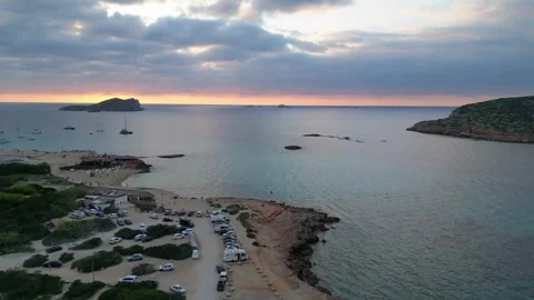 Boats at Sunset at cala comte beach, ibiza. Great aerial view flight drone Video stock 274765371
