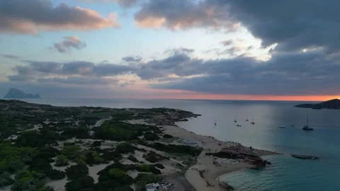 Boats at Sunset at cala comte beach, ibiza. Fabulous aerial view flight drone Video stock 274765651