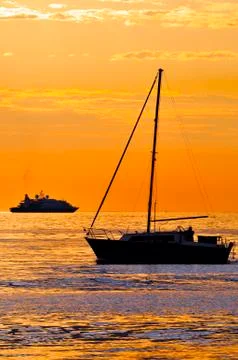 Boats at sunset Stock Photos