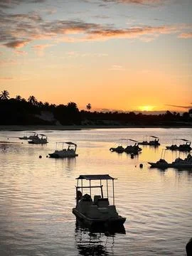 Boats at sunset Stock Photos
