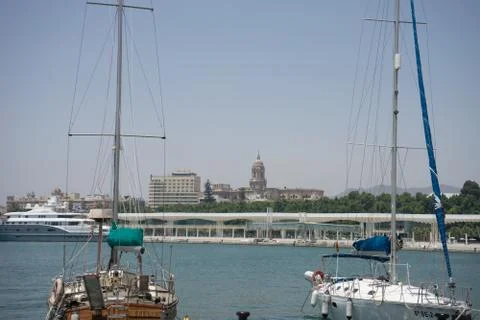 Boats with their sails down docking at the harbour in Malaga, Spain, Europe Stock Photos