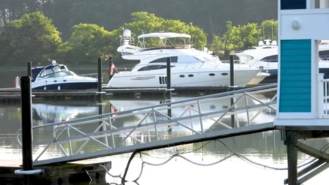 Boats tied up at dock Stock Footage 135990098