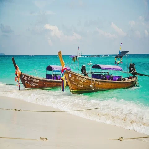 Boats on a tropical beach Stock Footage 69280582
