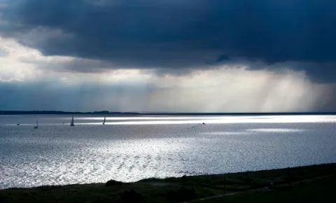 Boats under dark sky Photos