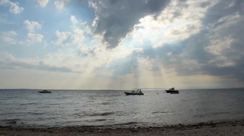 Boats under a dramatic cloudy sky 2 Stock Footage 33268009