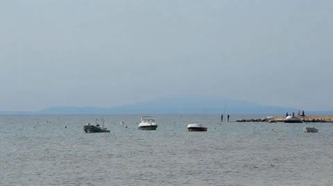 Boats under a misty sky 2 Stock Footage 33239241