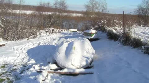 Boats under the snow Stock-Footage 12410368