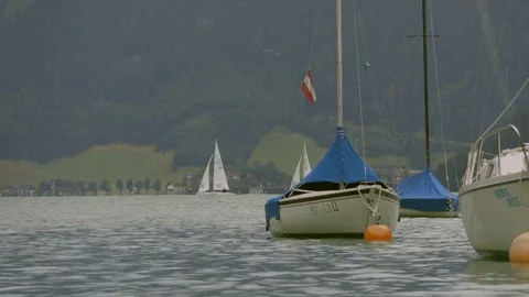 Boats on the waves in the lake Stock Footage 81936025