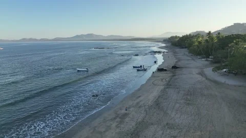 BoatsLoadingAtDawnBeach Stock Footage 171629538
