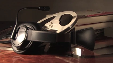 Bobbin and headphones are on the table Stock Footage