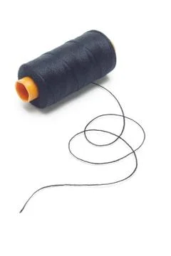 Bobbin of black cotton thread Stock Photos