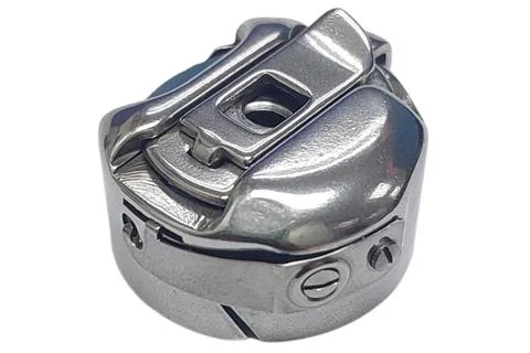 Bobbin case for vertical hook. Part from a sewing machine Foto stock