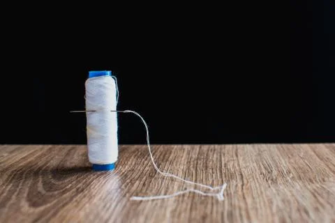 Bobbin with white thread Stock Photos