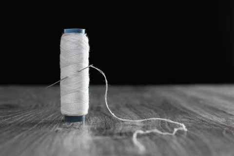 Bobbin with white thread Stock Photos