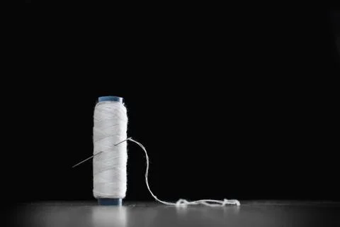 Bobbin with white thread Stock Photos