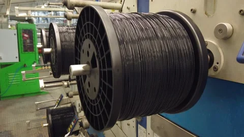 Bobbin winding machine. Detail from a spool with plastic filament Stock Footage 150274930