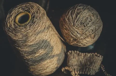 Bobbin yarn, with a ball and a started knitting project. Yarn for knitting Stock Photos