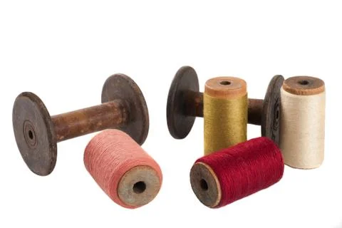 Bobbins and colored threads Stock Photos