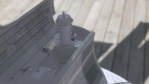 Bobbins being electronically threaded by a modern sewing machine 動画素材 312156870