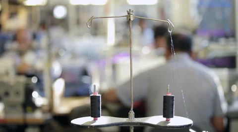 Bobbins holding threads of a sewing machine Stock Footage 31444481